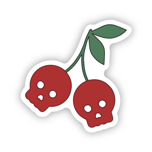 Sticker in the shape of a cherry stem but with cute little red skulls as the cherries